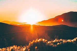 view of a sunset and hills representing positive recovery