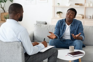 man talking to father about what is individual therapy 