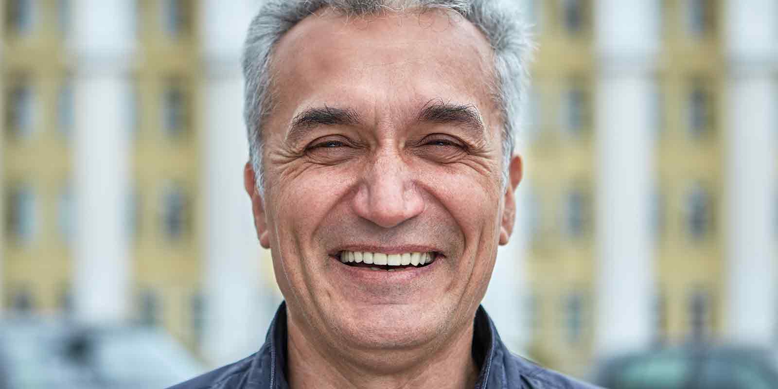 older man smiling while in his Outpatient Program
