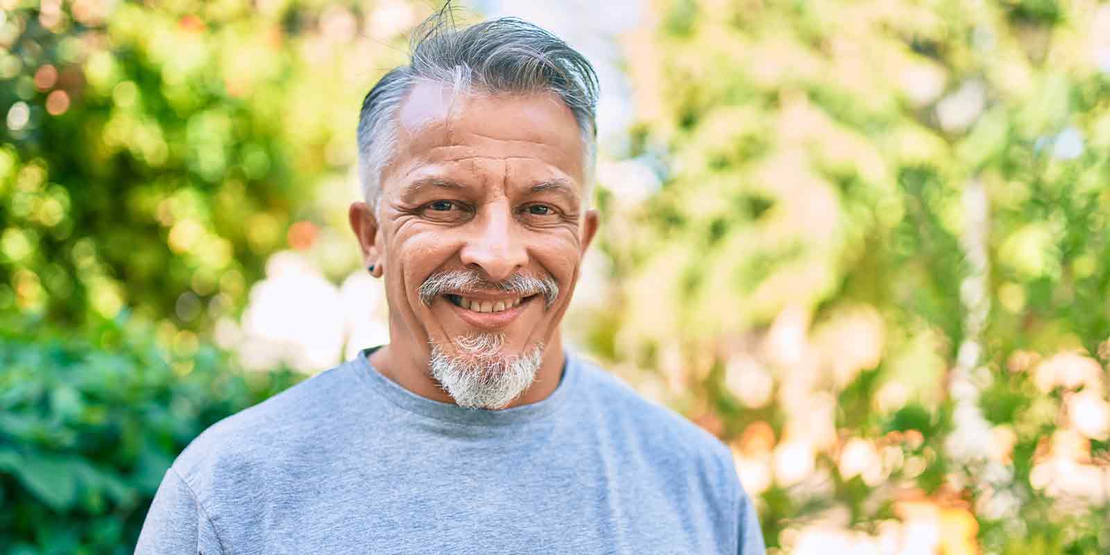 male smiling while in a outpatient program
