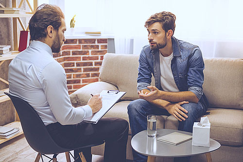 an individual therapy session being help with an addiction recovery patient