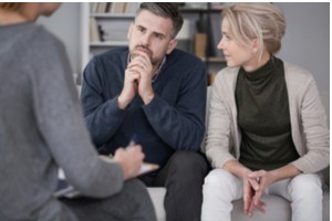 Couple during an intensive outpatient program with therapist