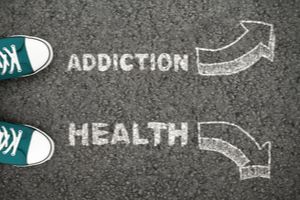 Road showing two different directions addiction and health