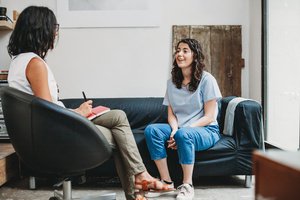 A therapist and a young woman during an intensive outpatient program session