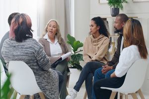 Self-help group member discussing recovery