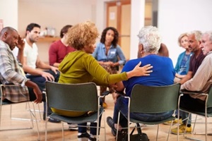 DC residents attending self help therapy group meeting in community center