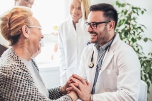 group of DC IOP doctors visiting patients