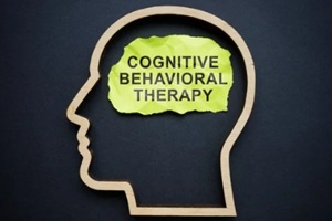 outline of the head and inscription Cognitive behavioral therapy CBT