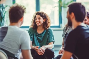 people support each other in a rehab session