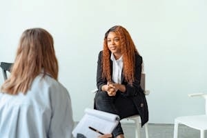 Professional Girl Discussing Her Issues with a Therapist