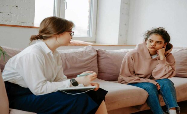 Female Patient Listening to Therapist