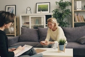 Stressed Woman Talking to A Therapist