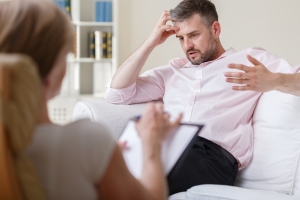 Man Sharing His Problems to A Therapist