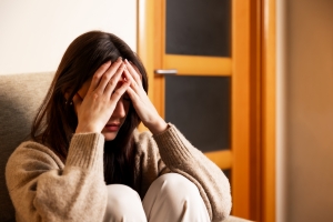 Woman Experiencing Stress and Mental Health Issues