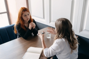 Female Patient in Mental Health Therapy Session with Therapist