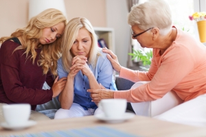 Family Members Supporting a Woman to Overcome Mental Challenges