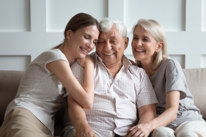 Man Smiling After Mental Health Recovery with Family Support